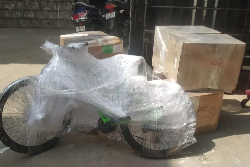 Customers houshold items and bike packed for shifting to another colony